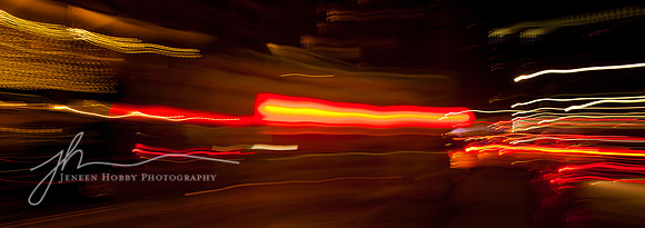 Tail lights in Central Park, New York City, abstract