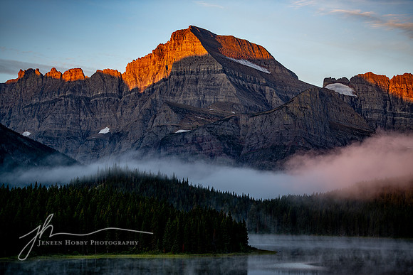 Mount Gould at sunrise, with fog, Glacier National Park, Montana