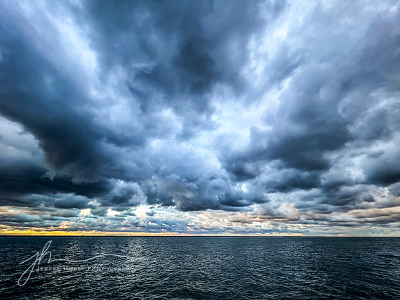 "Expanse of Sky and Sea"--Lake Erie with stormclouds, Cleveland